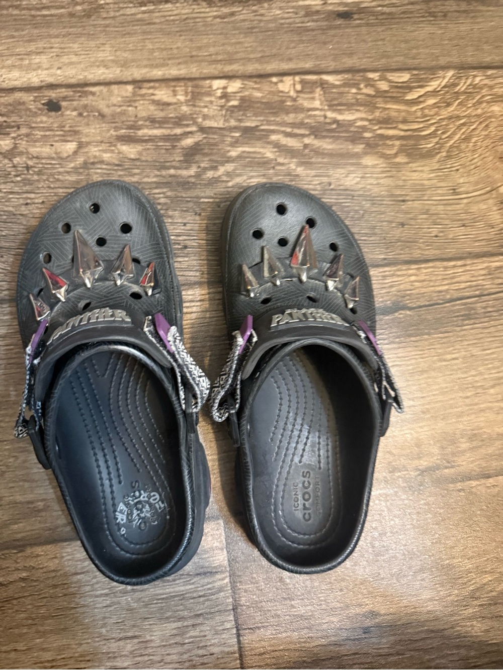 CROCS Kids Black Clogs with Silver Spike Accents and Purple Details
